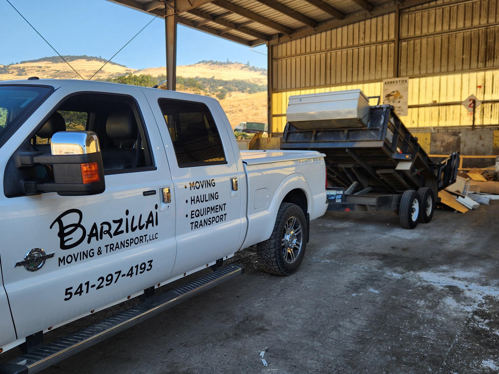Barzillai local hauling company trailer loaded with junk removal materials during a recent project in the Rogue Valley.